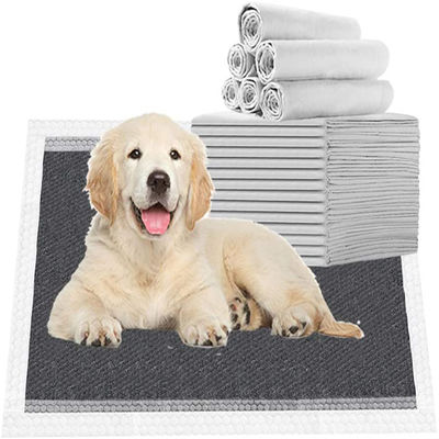 Pads de entrenamiento desechables para mascotas con carbón de bambú súper absorbente y pegatina adhesiva