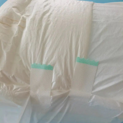 Prevención de fugas en 3D Pañales desechables para adultos de tejido no tejido para distribución